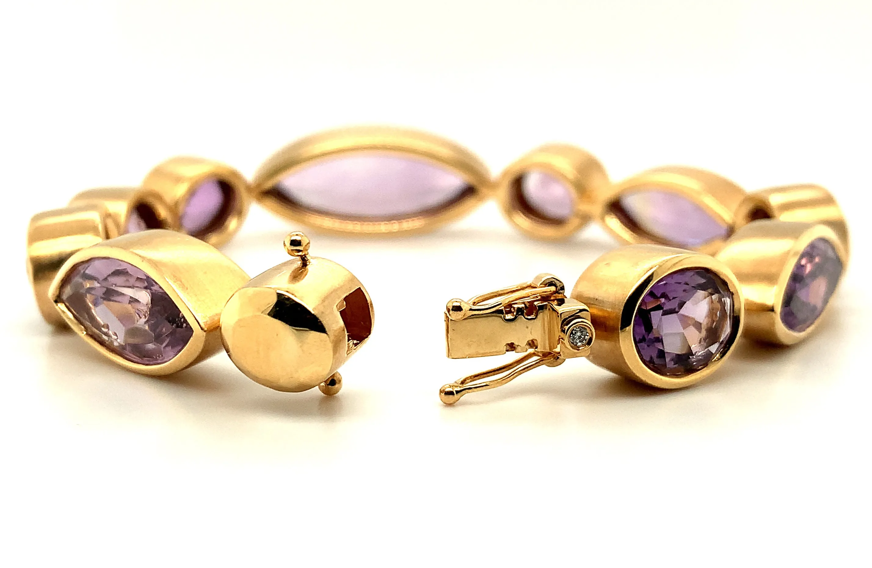 82.64 Carat Total Amethyst Marquise & Oval Bezel Yellow Gold Tennis Bracelet