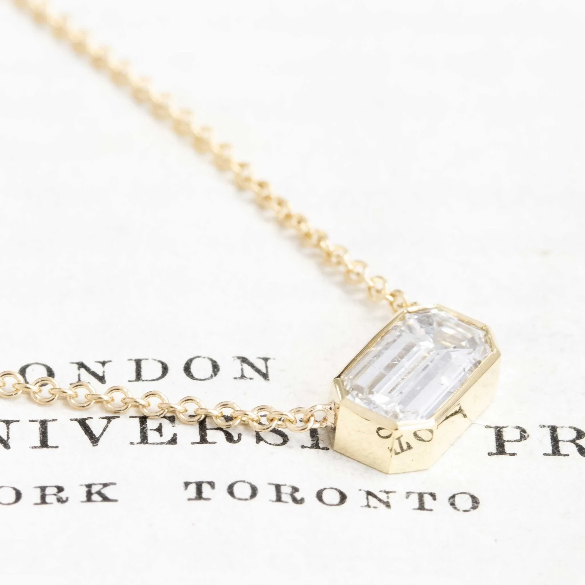 .87ct Emerald Cut Diamond Bezel Pendant