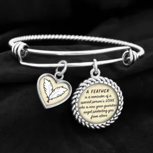 A Feather Reminds Us Charm Bracelet