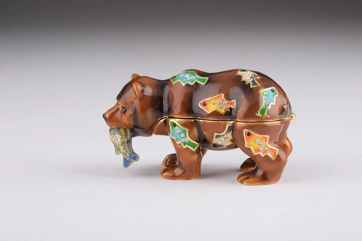 Brown Bear Holding Fish
