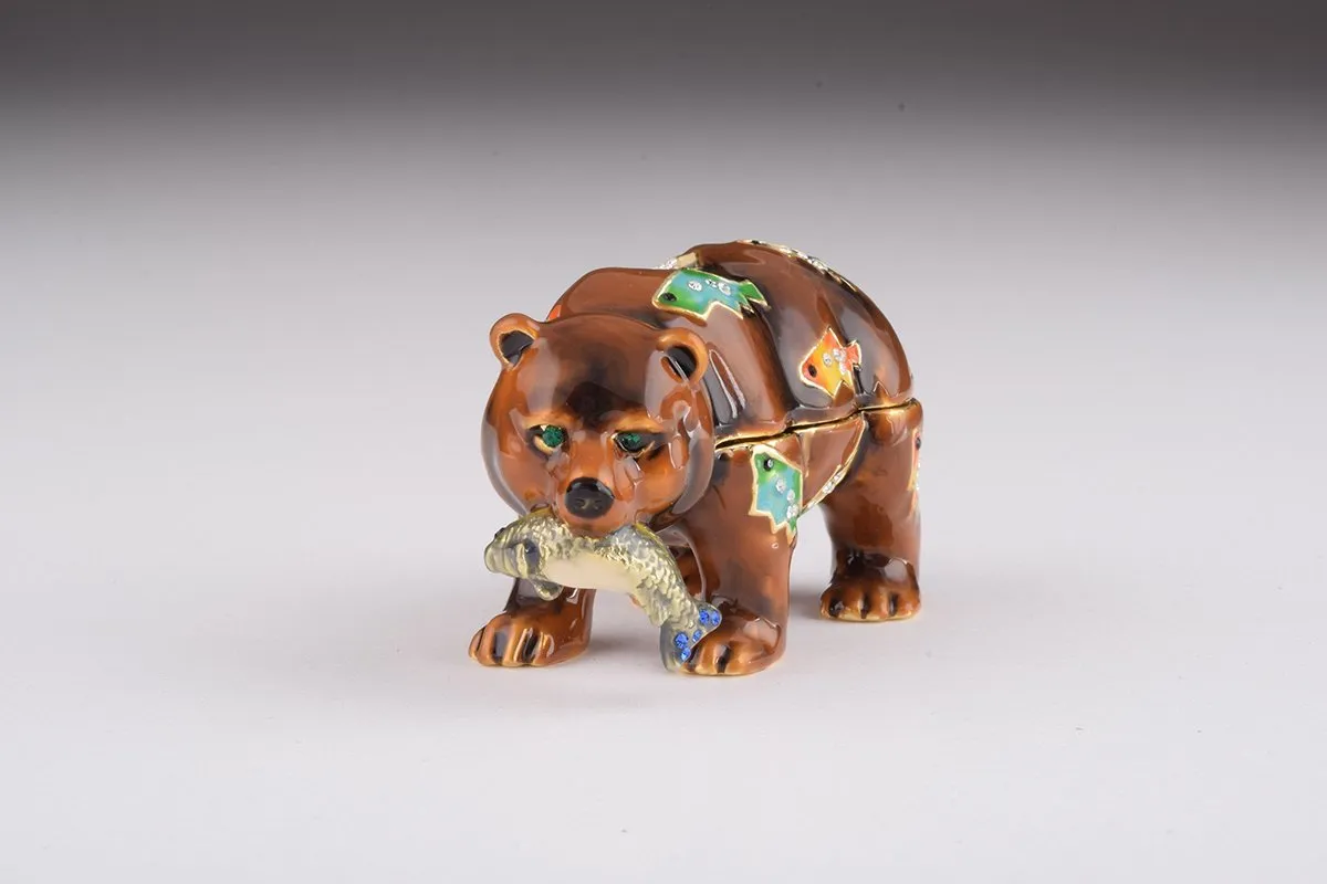 Brown Bear Holding Fish
