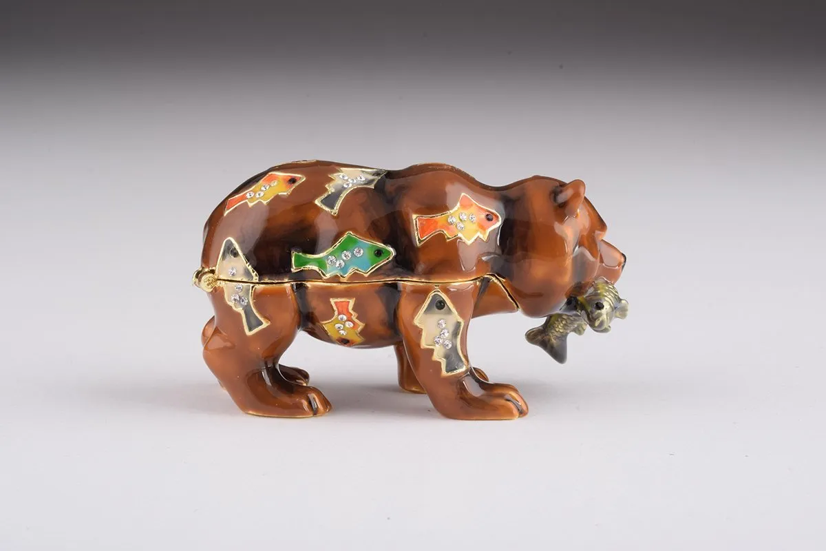 Brown Bear Holding Fish