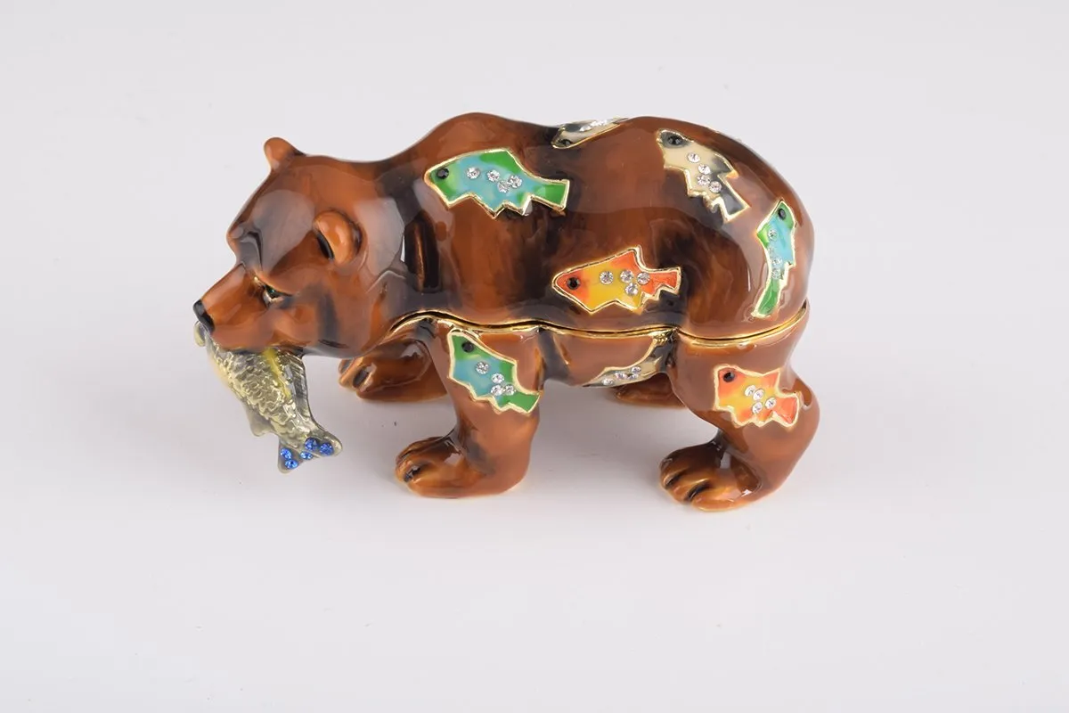 Brown Bear Holding Fish