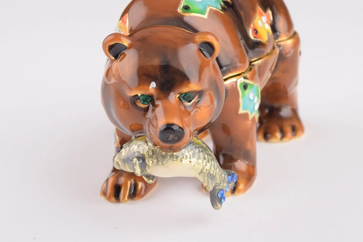 Brown Bear Holding Fish