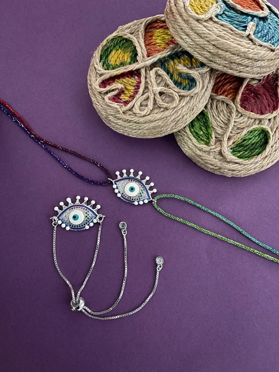 (Combo of 2) Diamond multicolour Evil Eye Charm Silver Bracelet & Thread Rakhi For Bhabhi-Brother