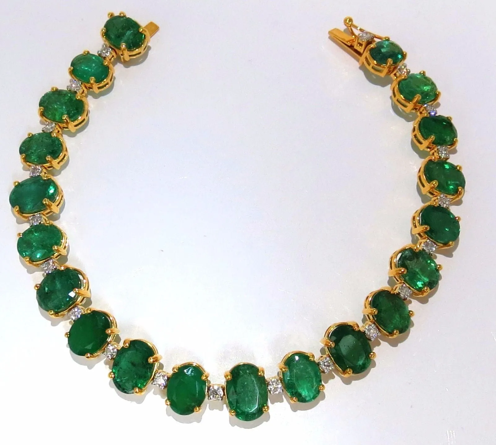 Emerald bracelet 27.42ct & .75ct diamonds classic tennis 14kt. natural greens