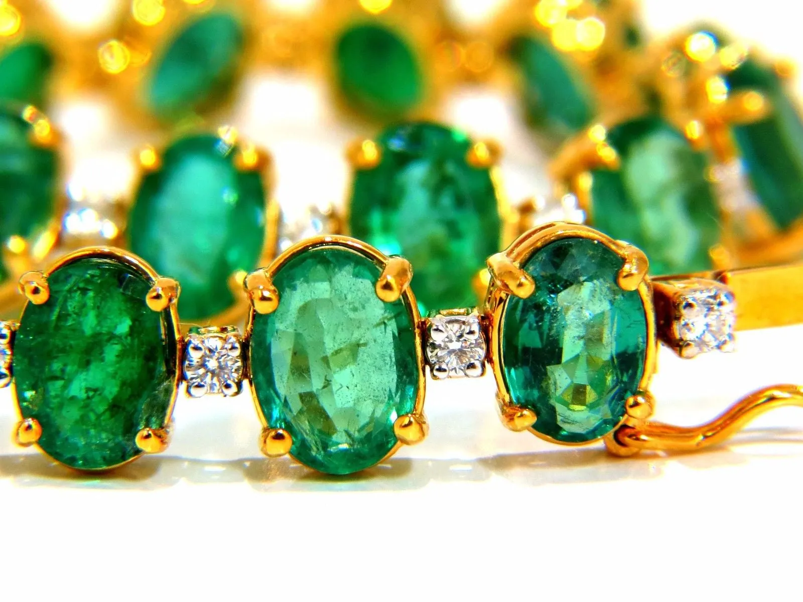 Emerald bracelet 27.42ct & .75ct diamonds classic tennis 14kt. natural greens