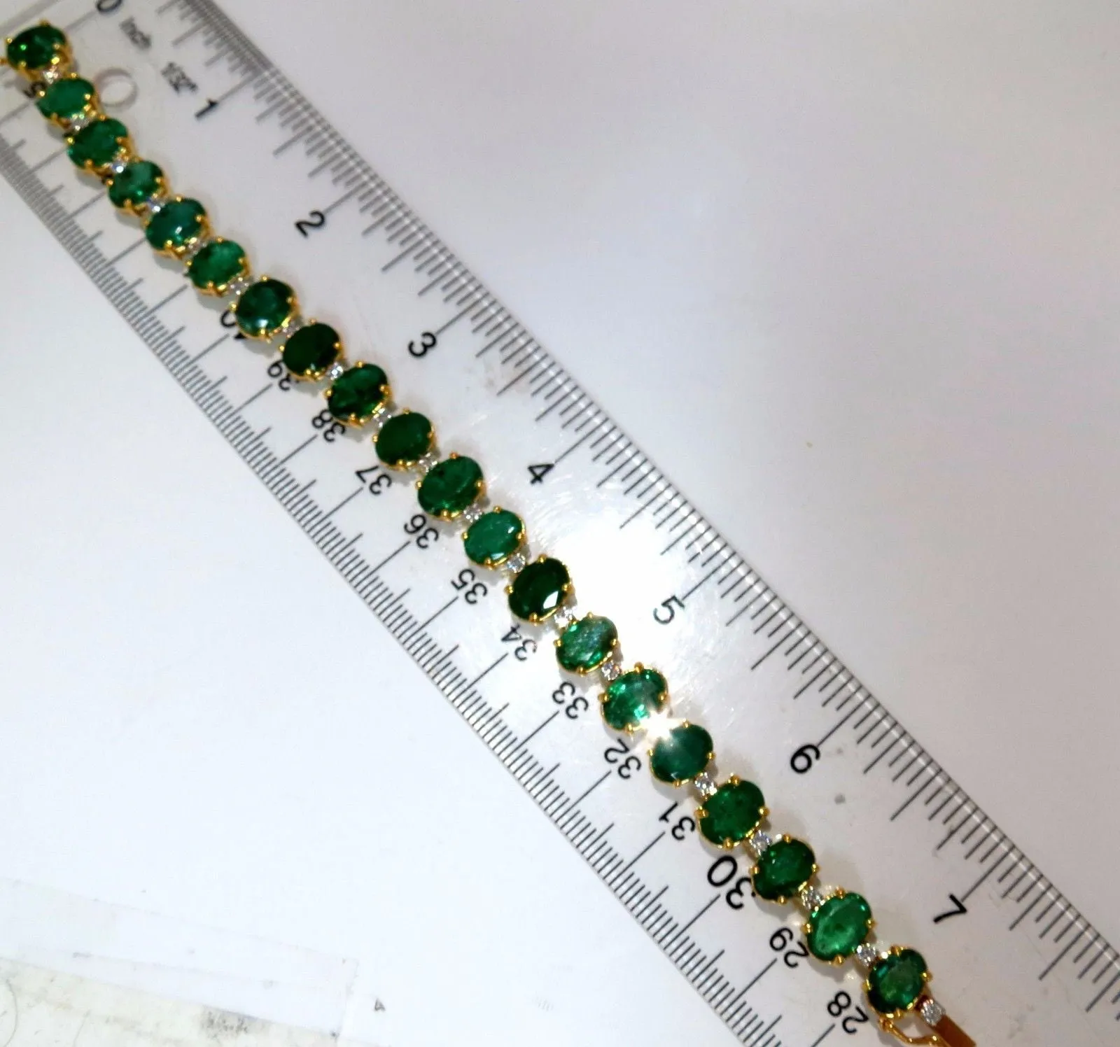 Emerald bracelet 27.42ct & .75ct diamonds classic tennis 14kt. natural greens