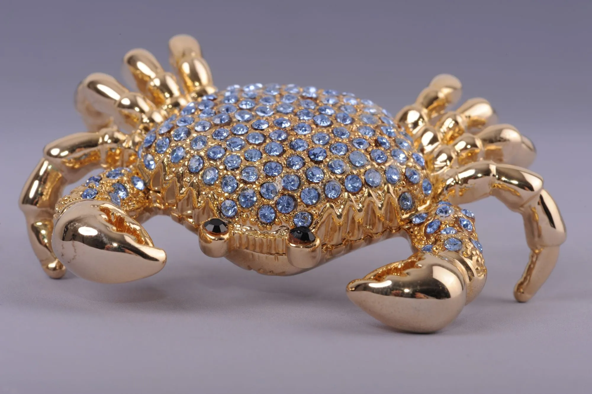 Golden Crab with blue stones
