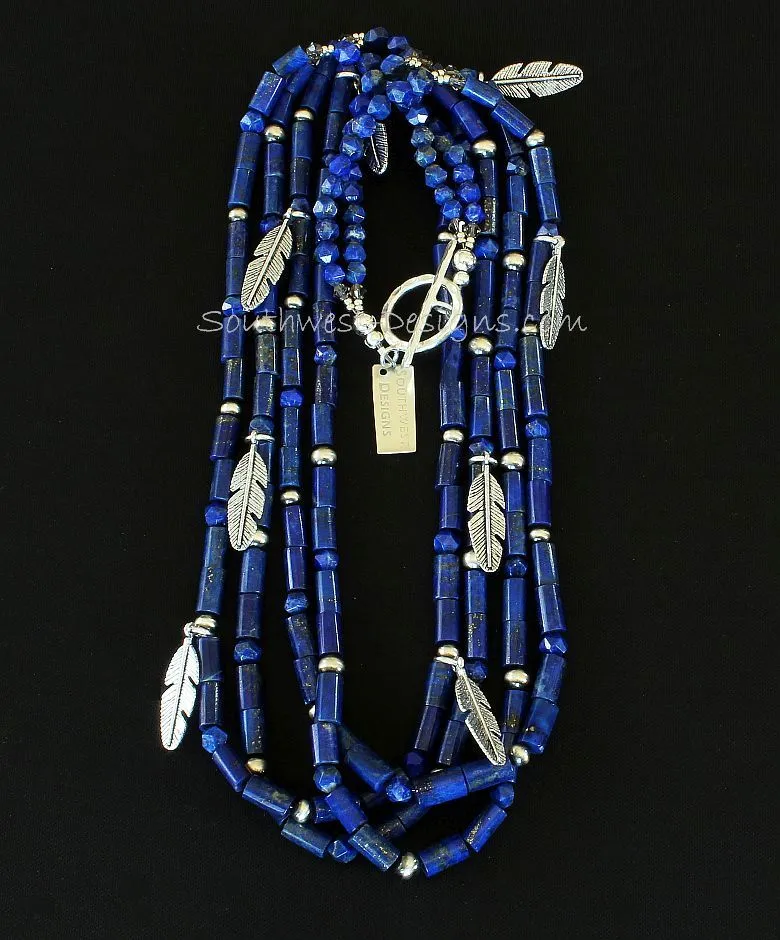 Lapis Lazuli Cylinder Bead 4-Strand Necklace with Lapis Faceted Rounds, Sterling Silver Oxidized Rounds, Sterling Feather Charms, and Hammered Sterling Silver Toggle Clasp