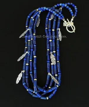 Lapis Lazuli Cylinder Bead 4-Strand Necklace with Lapis Faceted Rounds, Sterling Silver Oxidized Rounds, Sterling Feather Charms, and Hammered Sterling Silver Toggle Clasp