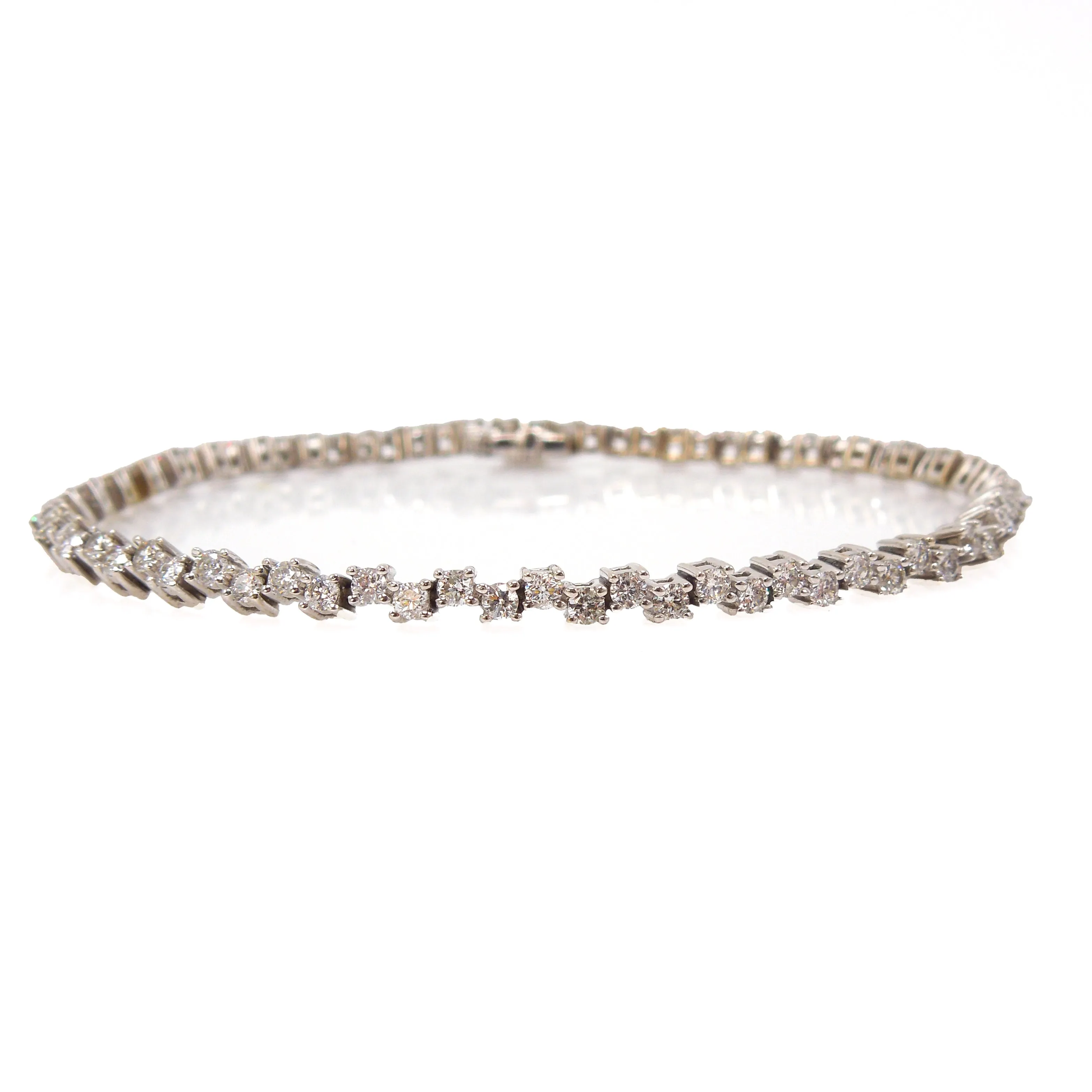 Nearly 2.5 Carats Staggered Diamond Tennis Bracelet in White Gold