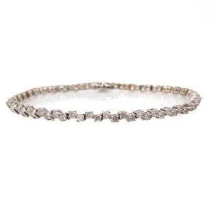Nearly 2.5 Carats Staggered Diamond Tennis Bracelet in White Gold