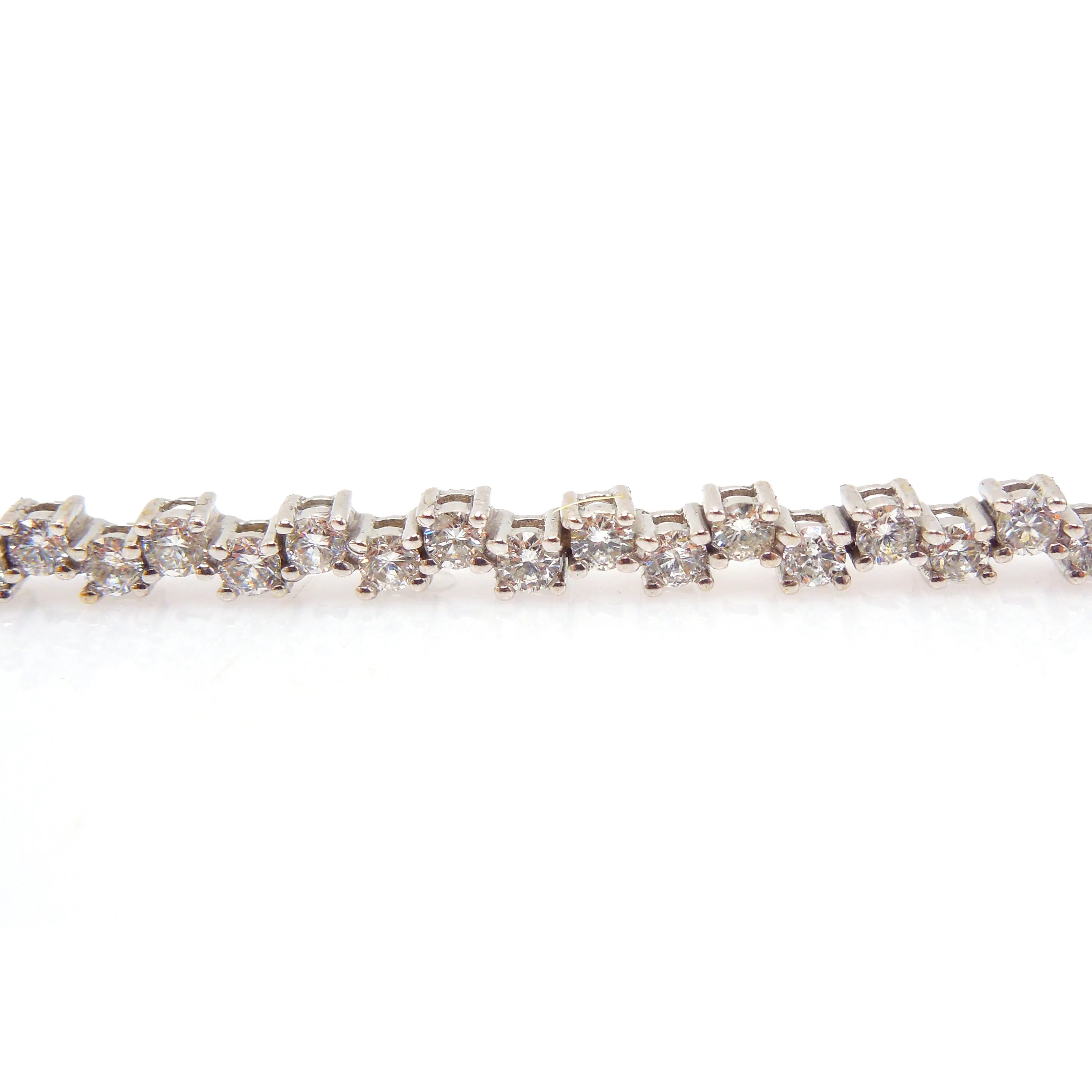 Nearly 2.5 Carats Staggered Diamond Tennis Bracelet in White Gold