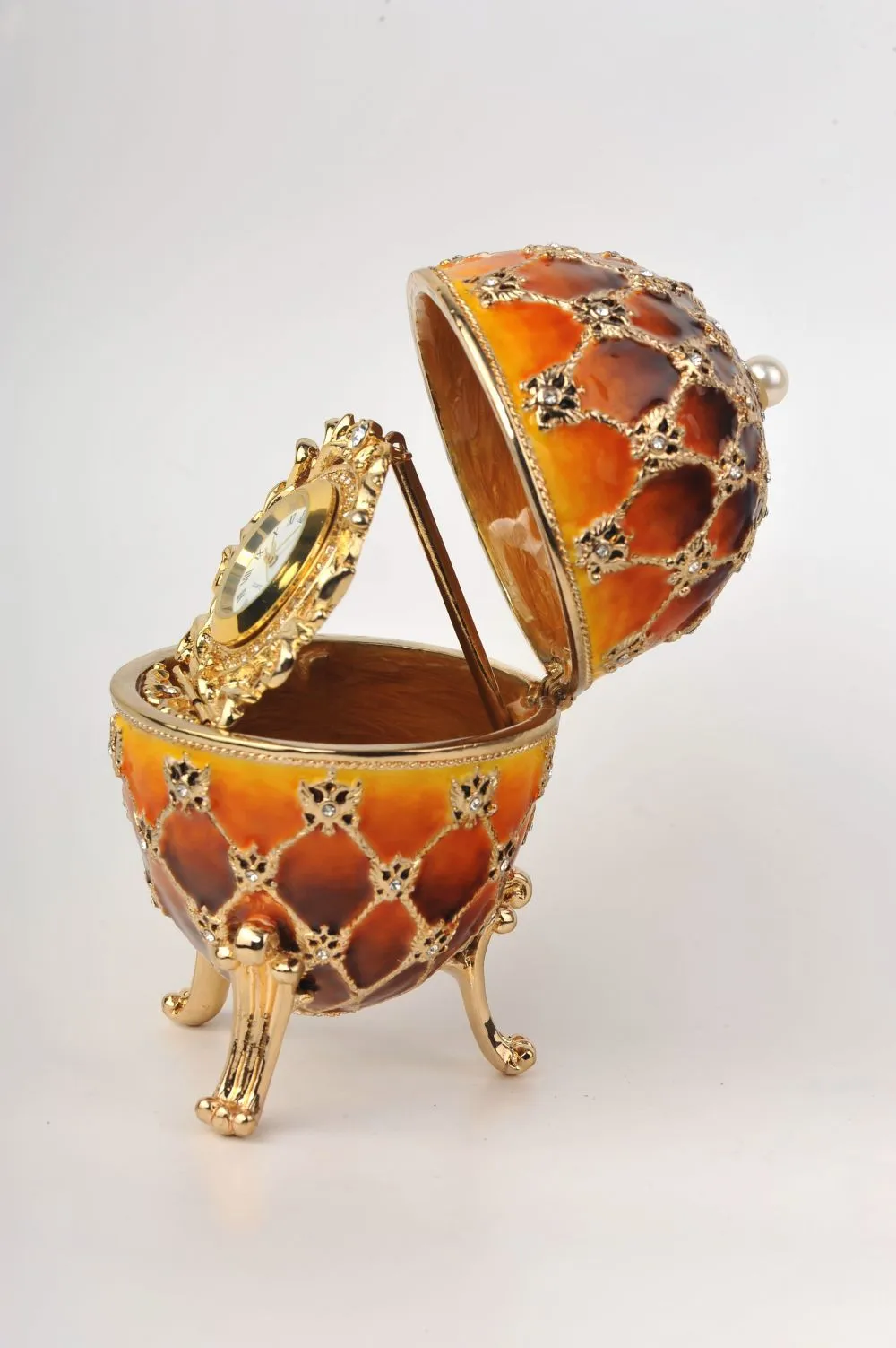Orange and Yellow Faberge Egg with a Gold Clock