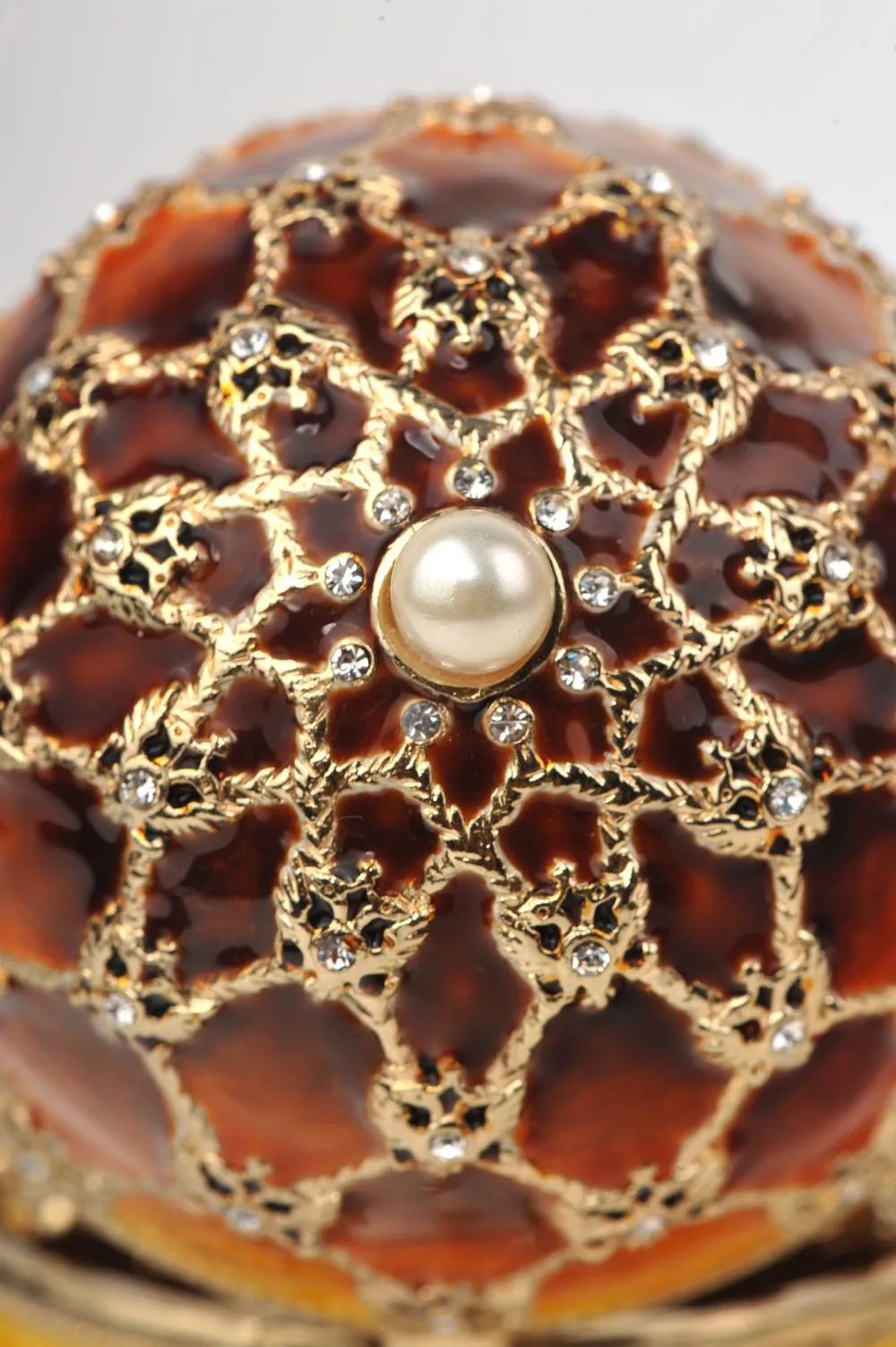 Orange and Yellow Faberge Egg with a Gold Clock