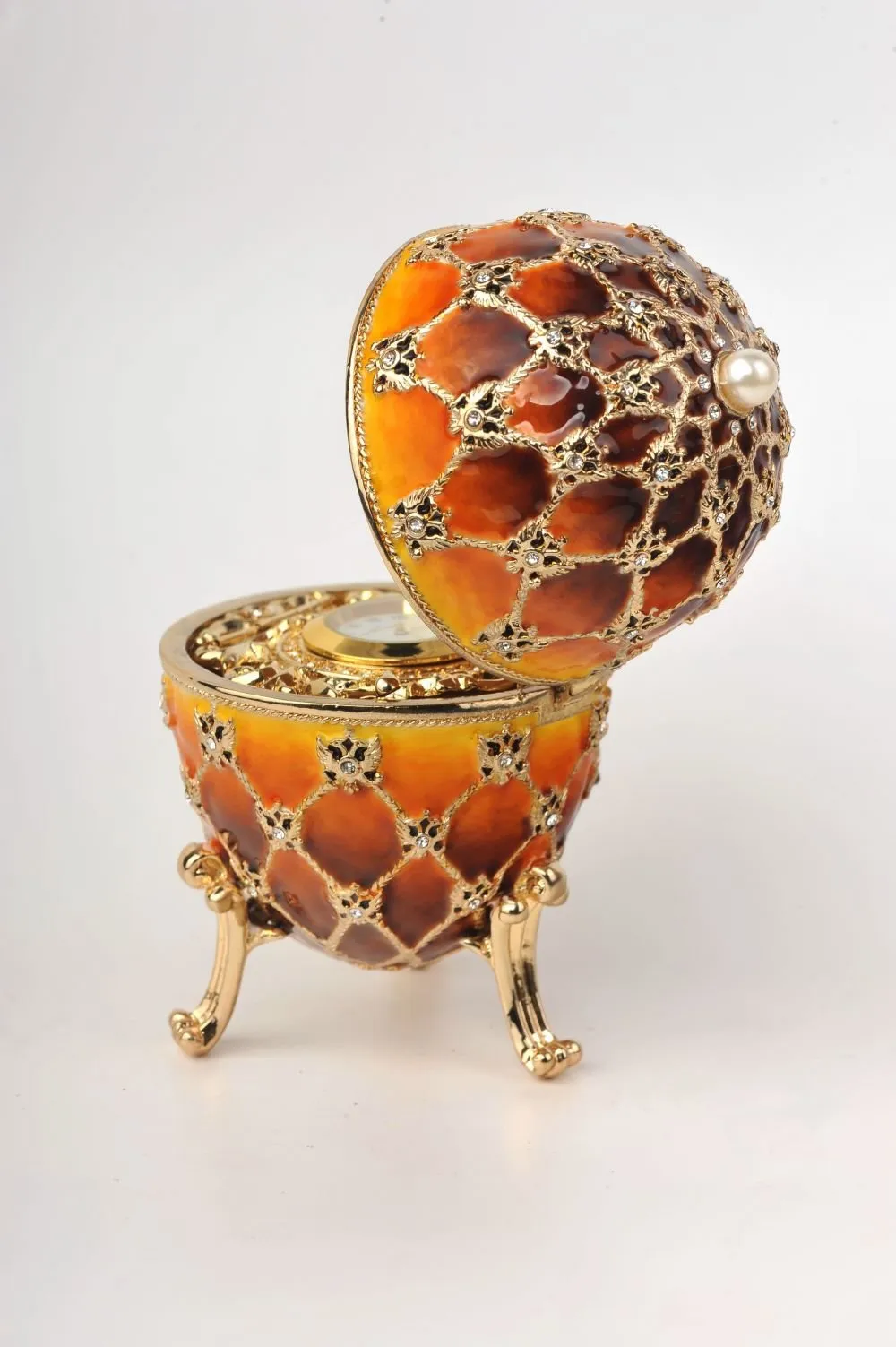Orange and Yellow Faberge Egg with a Gold Clock