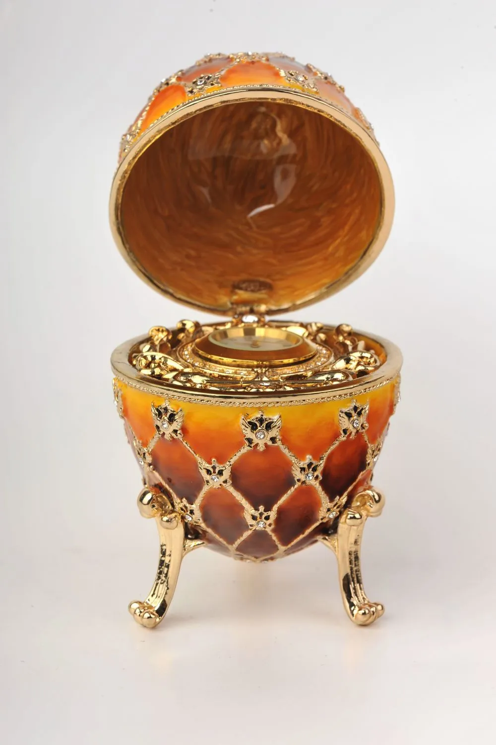 Orange and Yellow Faberge Egg with a Gold Clock
