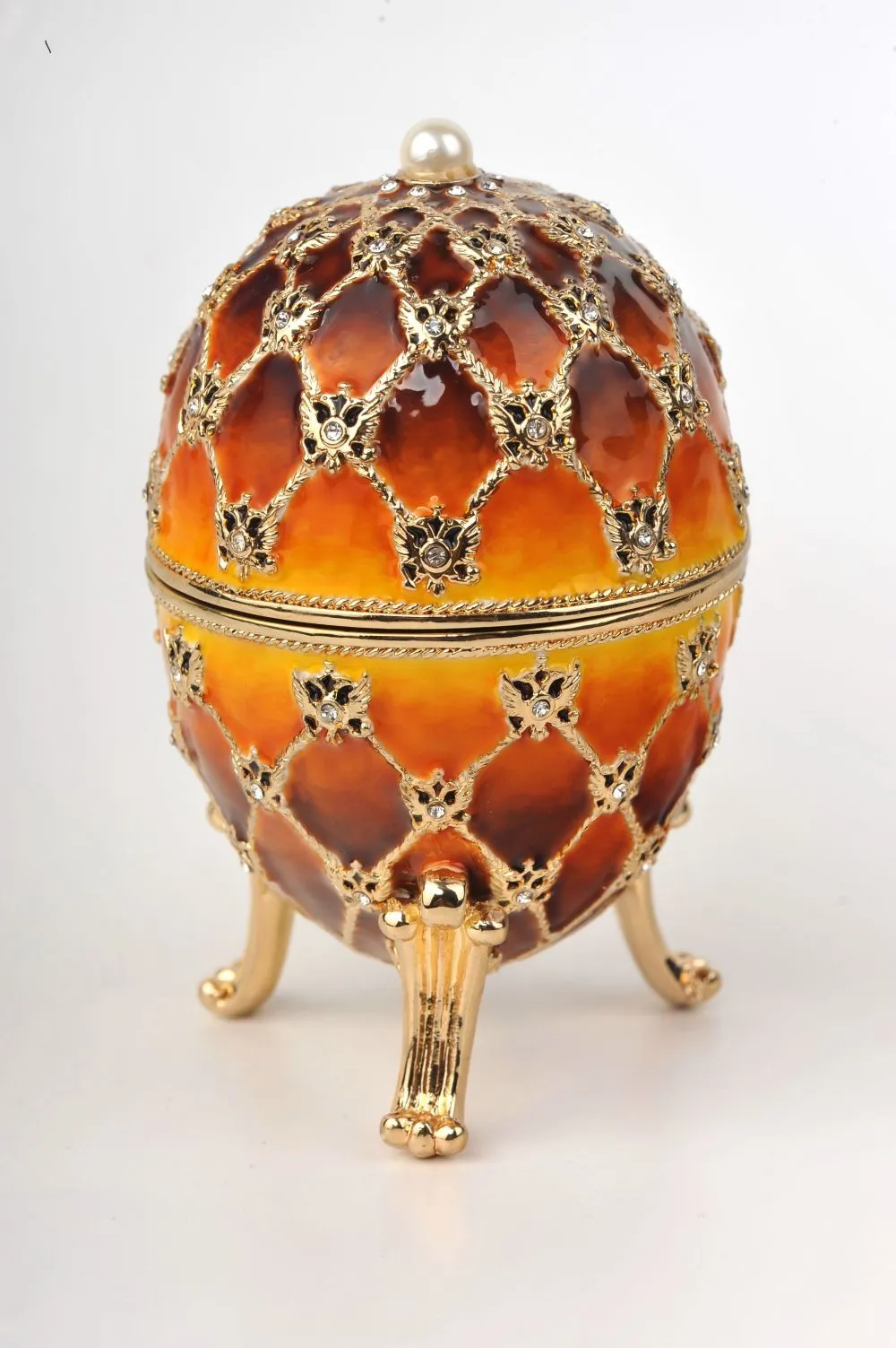 Orange and Yellow Faberge Egg with a Gold Clock