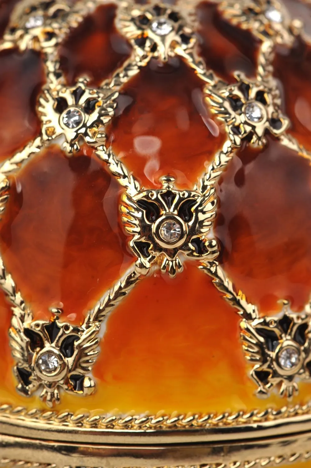Orange and Yellow Faberge Egg with a Gold Clock