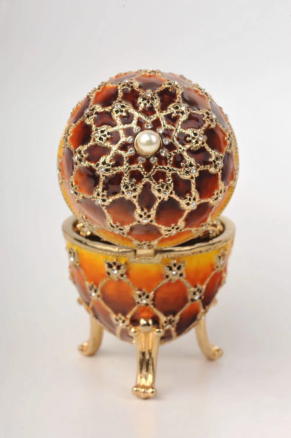 Orange and Yellow Faberge Egg with a Gold Clock