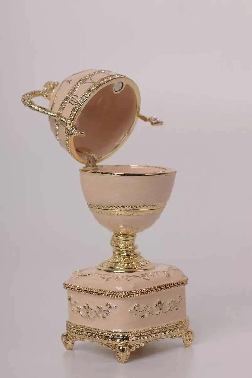Pink Faberge Egg with Gold Handles