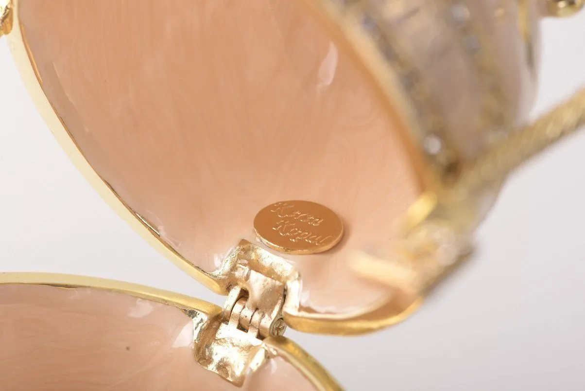 Pink Faberge Egg with Gold Handles