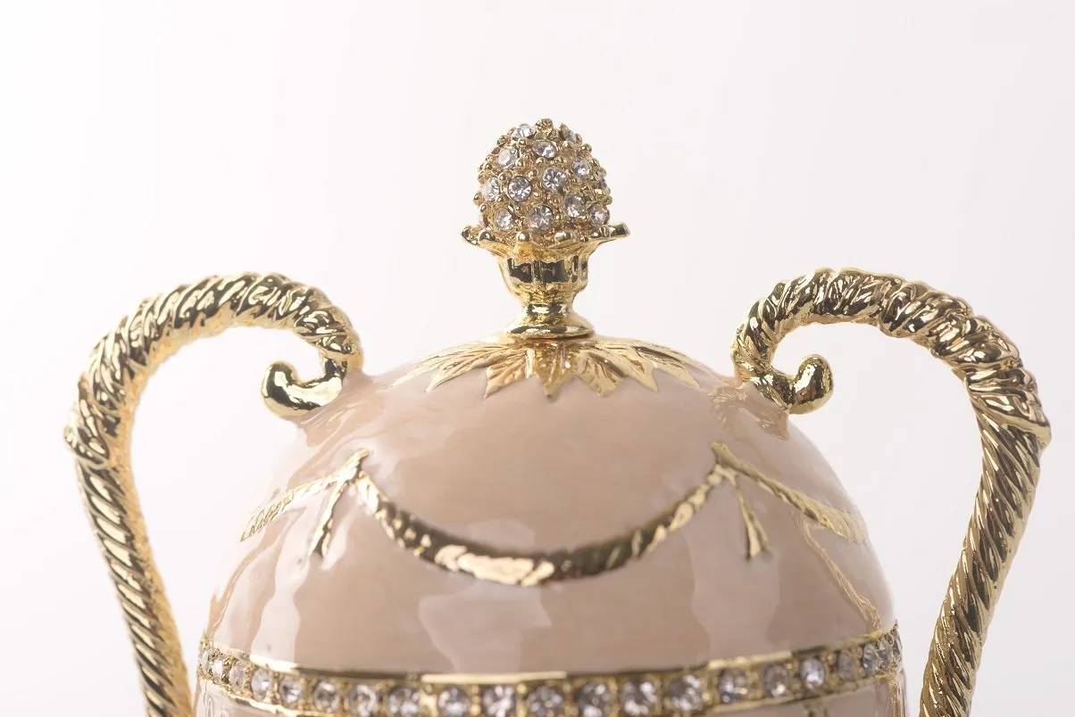 Pink Faberge Egg with Gold Handles