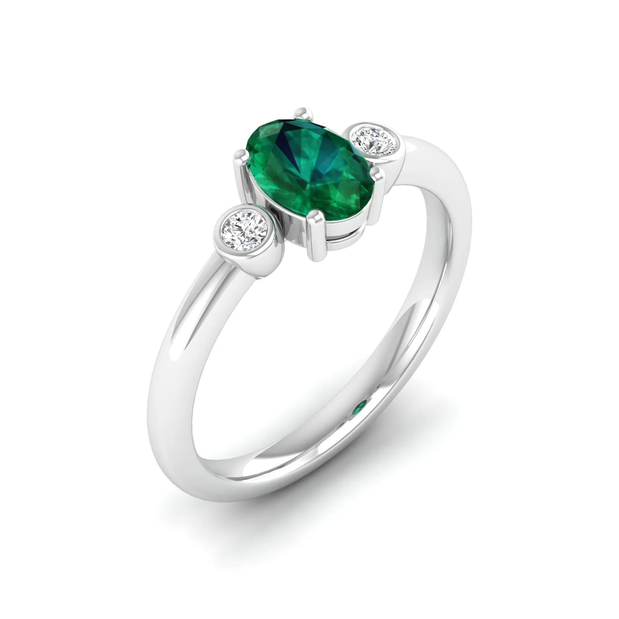 Prong-Set Oval Emerald and Bezel Diamond Ring