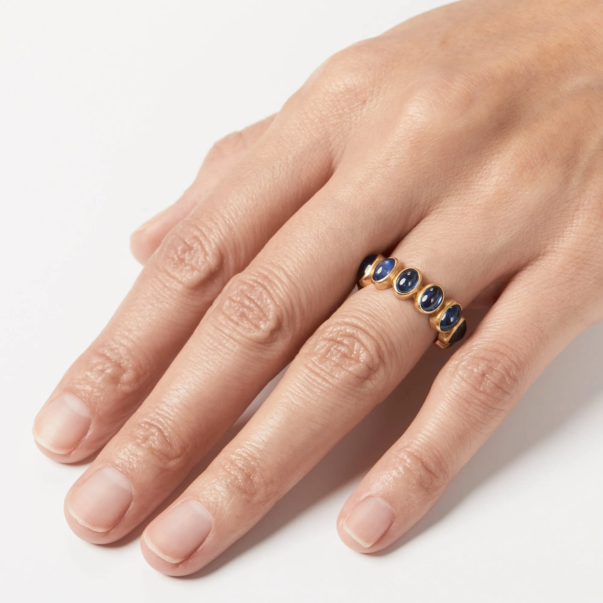 Renaissance Cabochon Oval Blue Sapphire Band in 20K Peach Gold