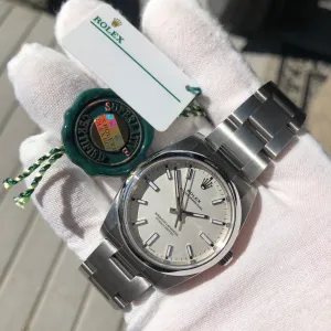 Rolex Oyster Perpetual 114200 White Stainless Steel Automatic Wristwatch Box Papers Circa 2019