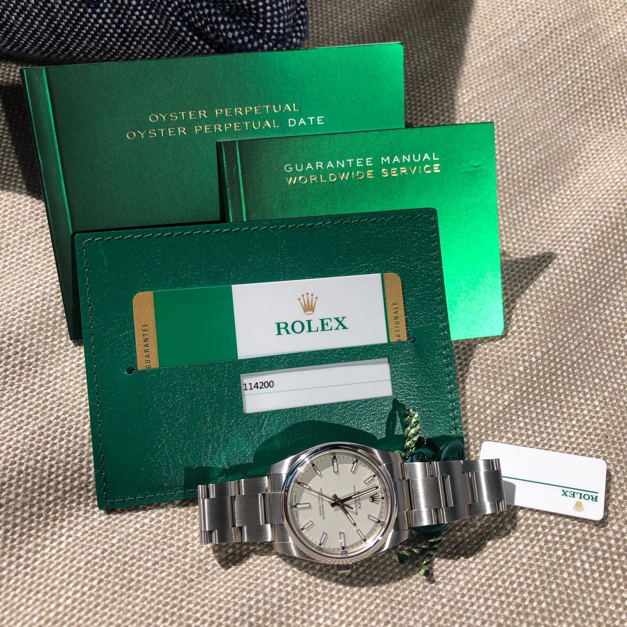 Rolex Oyster Perpetual 114200 White Stainless Steel Automatic Wristwatch Box Papers Circa 2019