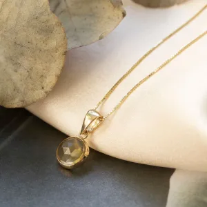 Round yellow gold pendant 8 mm inlaid with citrine stone