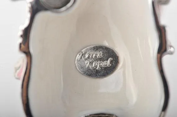 Silver Elephant Holding an Umbrella