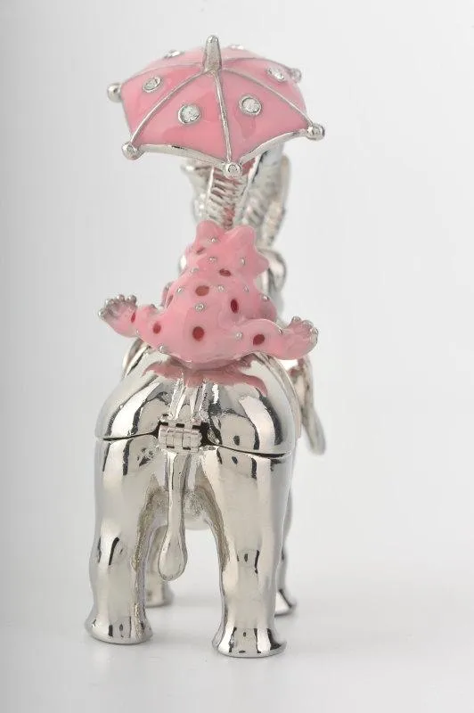Silver Elephant Holding an Umbrella
