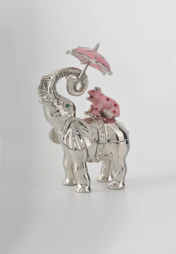 Silver Elephant Holding an Umbrella