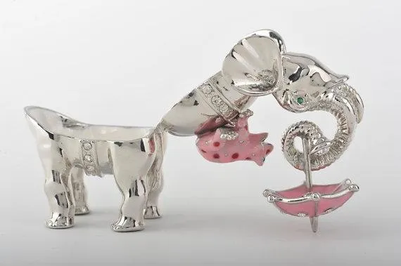 Silver Elephant Holding an Umbrella