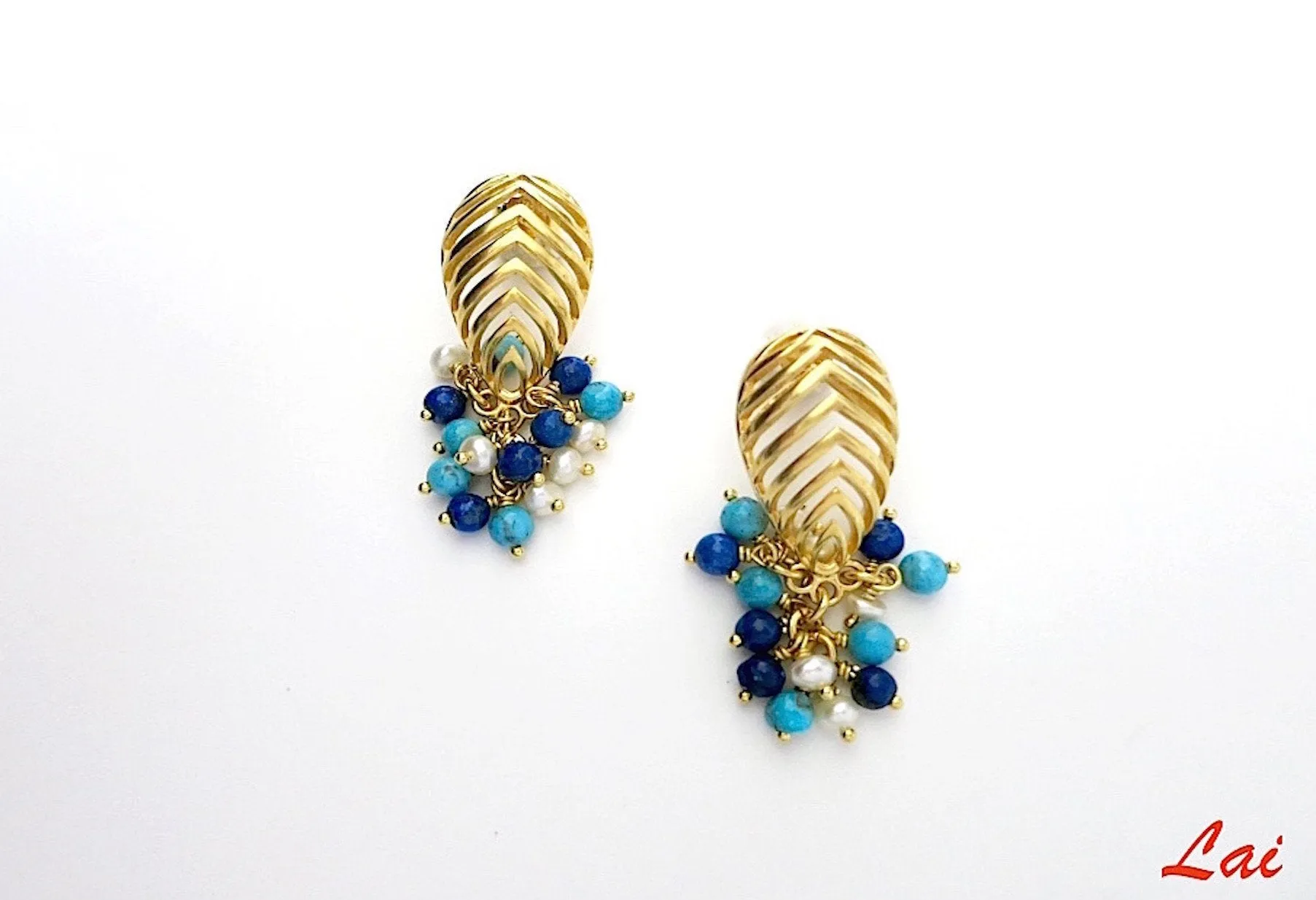 Striking, cut-work earrings with lapis, turquoise and pearls cluster