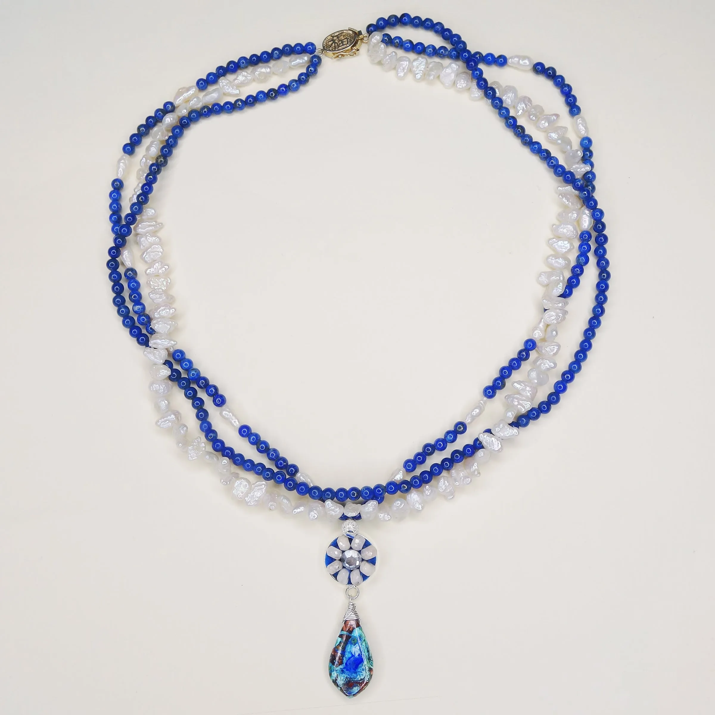 The Waves Curled Over Her Toes: white sapphire, lapis, pearl mosaic